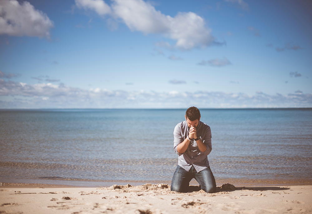 man praying